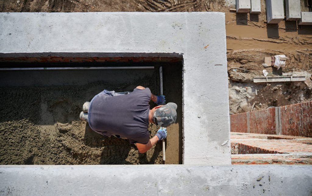 bricklayer-working-with-sand-doing-walls-fresh-air